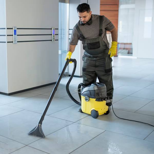 Industrial warehouse deep cleaning with modern equipment and tools